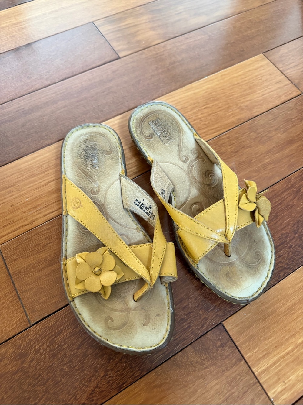 Born tan leather sandals with yellow accents